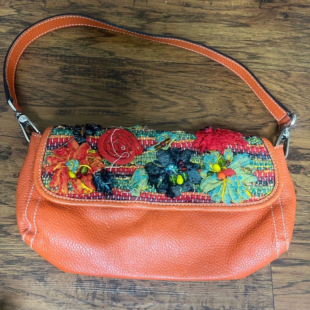 Chico's orange bag .
